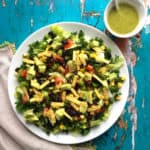 Vegan mexican salad with chopped kale and santa fe dressing