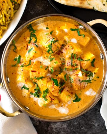 Authentic Indian Curry Shahi paneer served in a Indian bowl